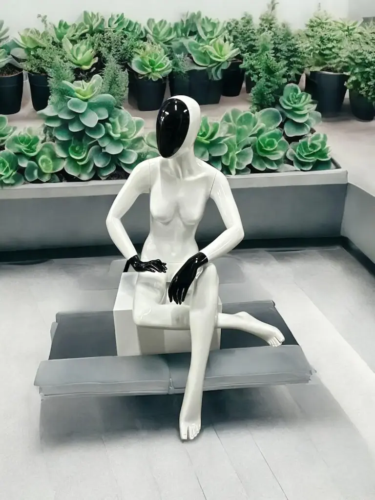 Mannequin woman sitting