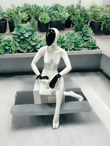Mannequin woman sitting